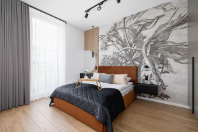 Apartment with access to Sauna and Gym in the Centre by Noclegi Renters